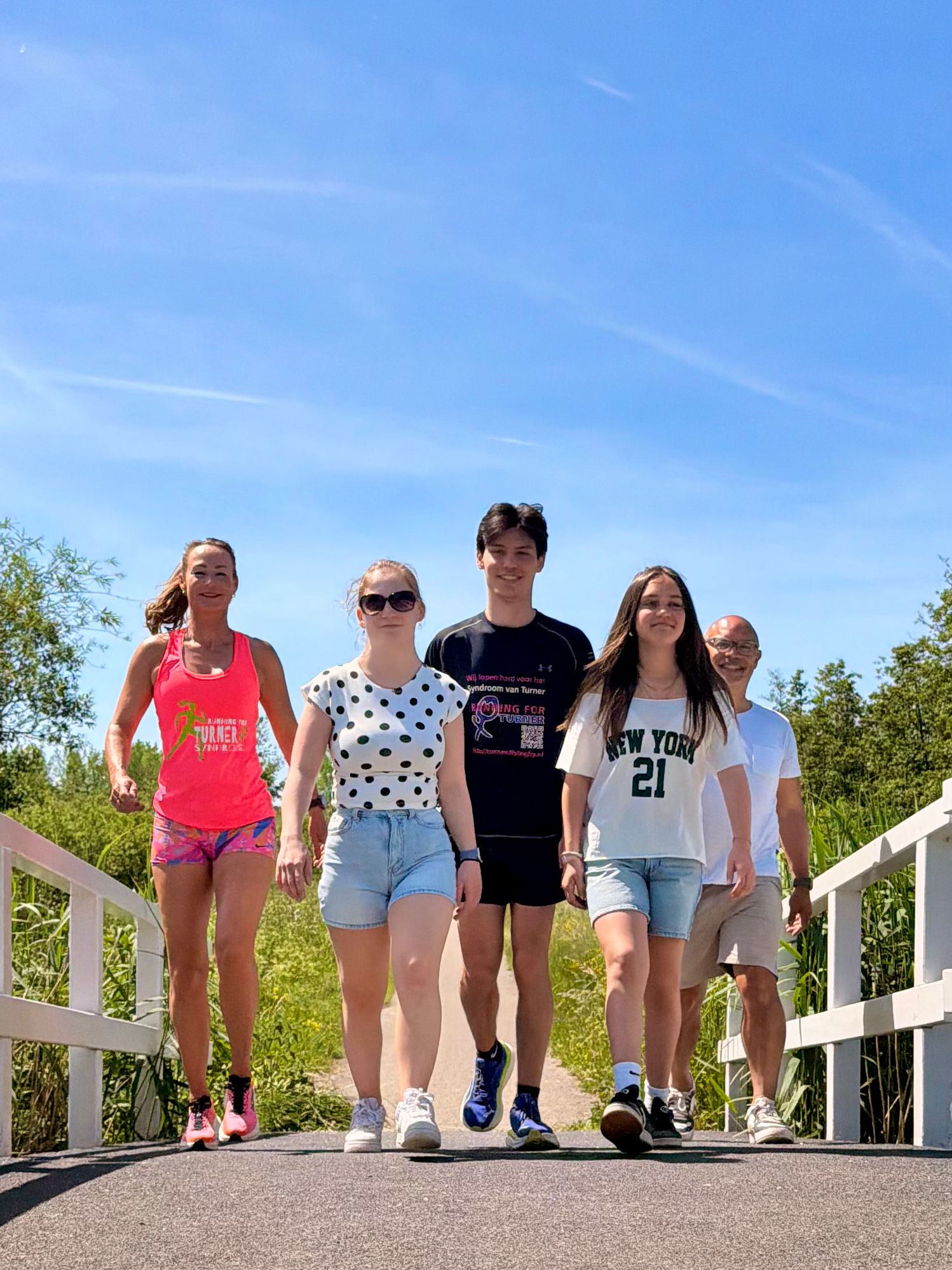 Lisette's family on a bridge